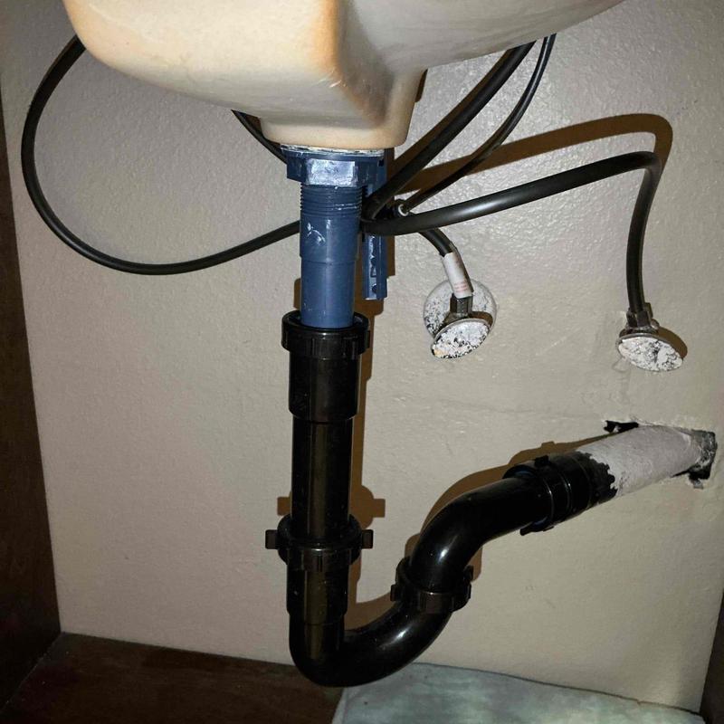 Bathroom sink pop-up drain assembly with new gasket