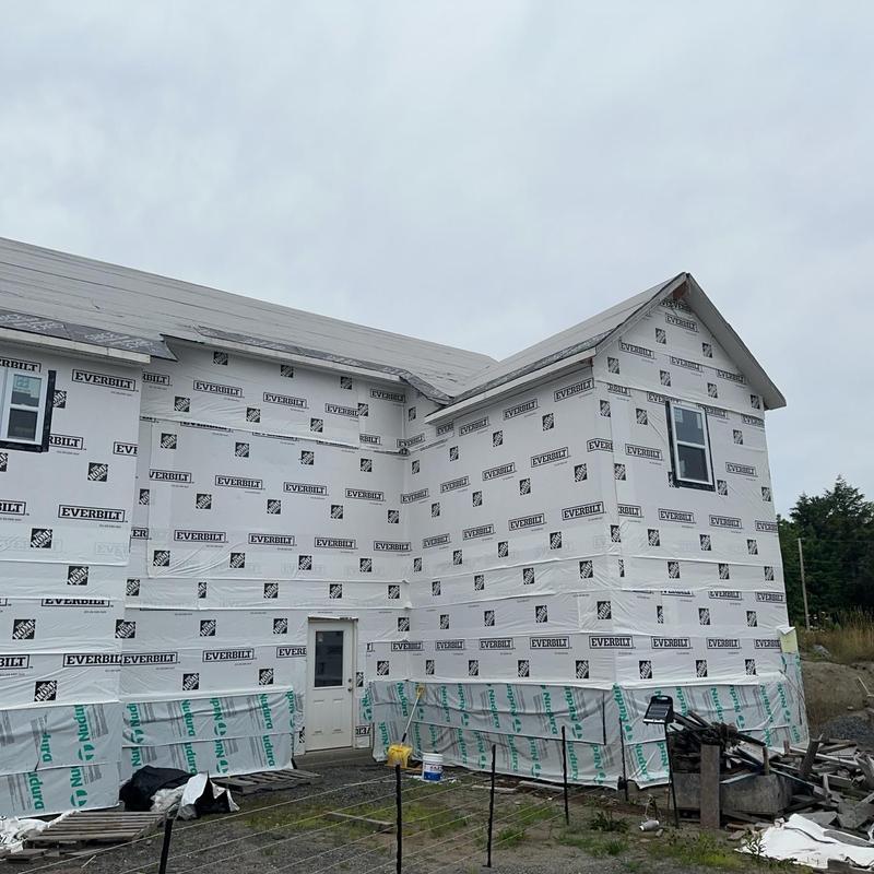 House wrap installation on residential exterior walls