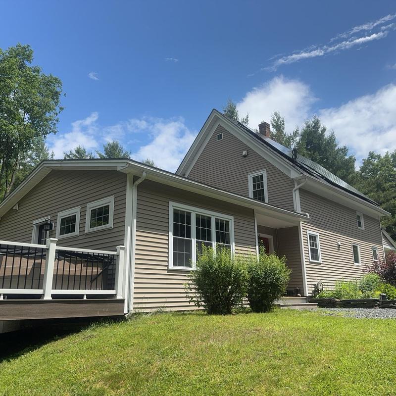 Asphalt shingle roof with metal snow belt in Barre, VT
