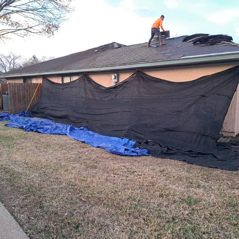 GAF Timberline HDZ roof installation with debris netting