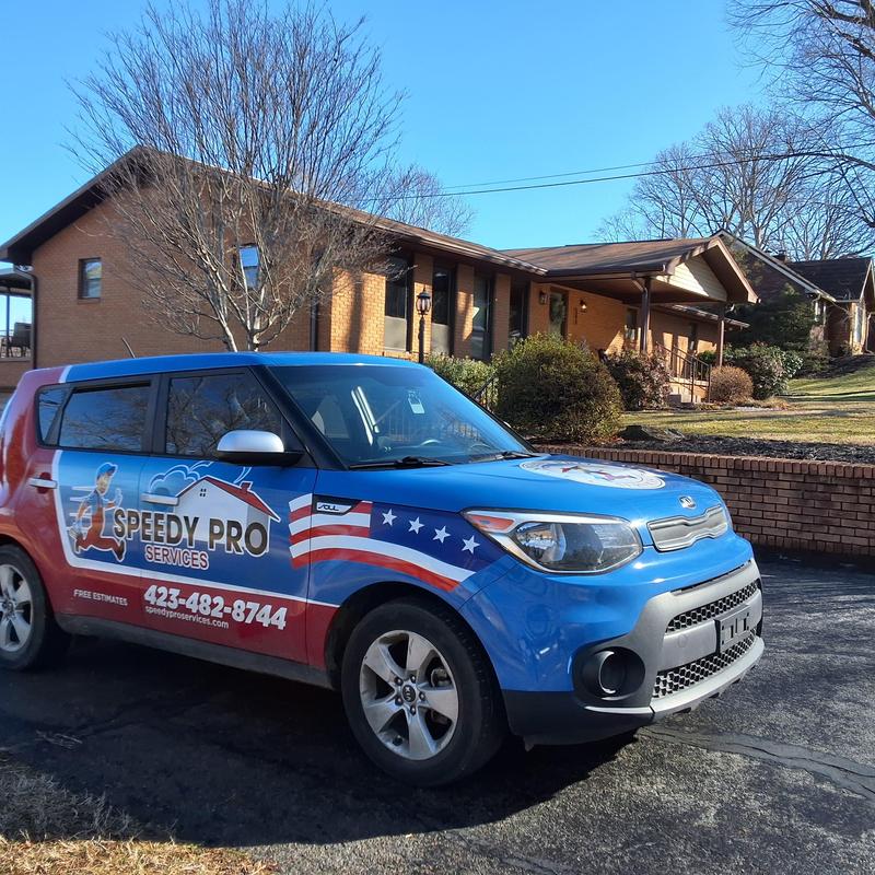 Roof inspection vehicle parked outside home