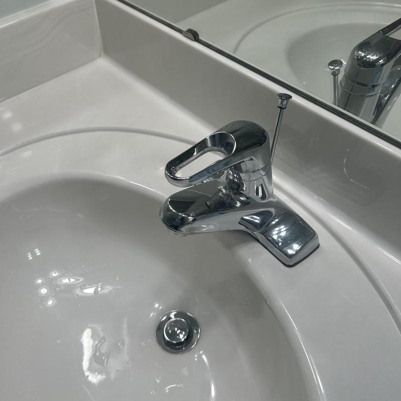 Bathroom sink faucet and drain with countertop