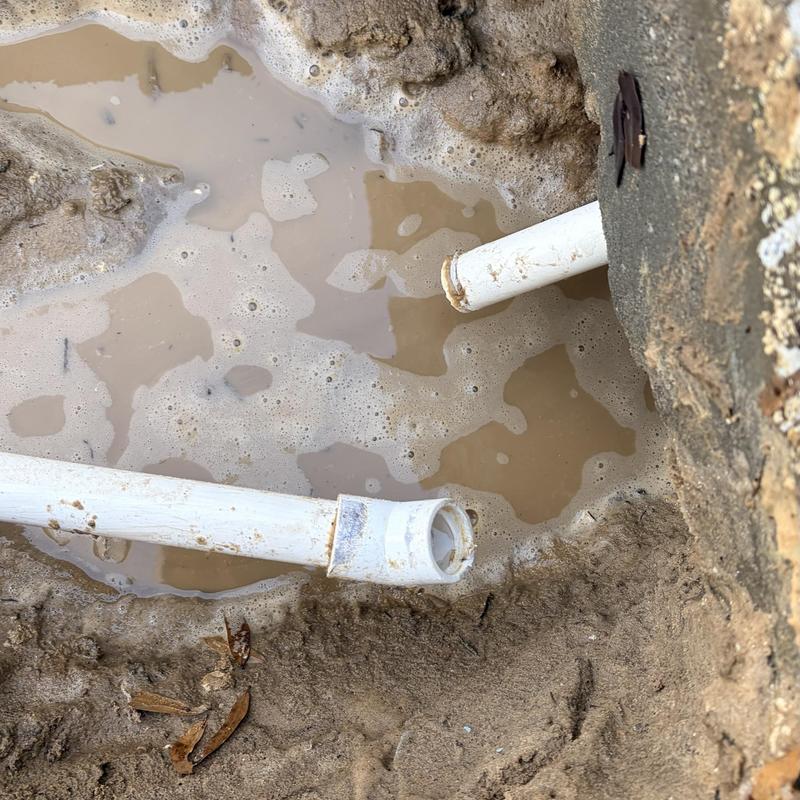 34 PVC water line with exposed broken pipe ends