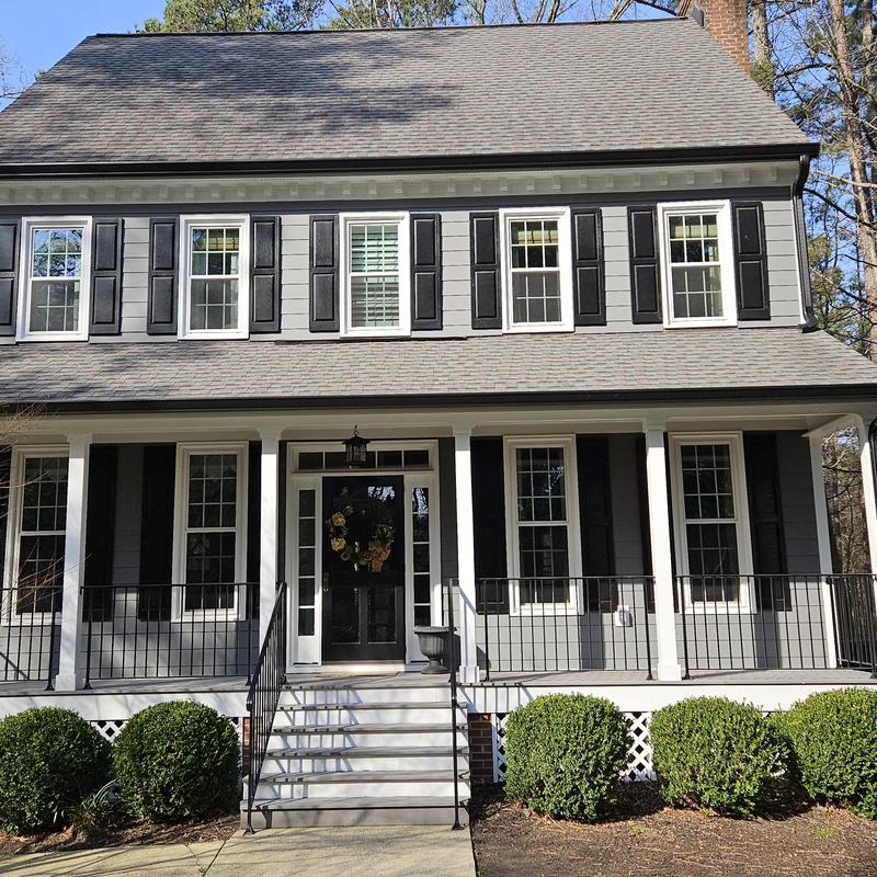 Siding and gutters on modern two-story home