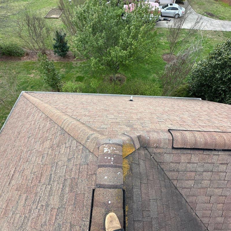 Asphalt shingle roof with hail damage and flashing issues