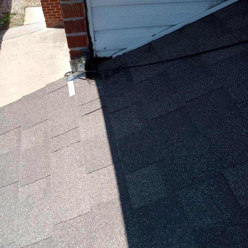 Asphalt roof shingles near flashing and wiring Asphalt roof shingles near flashing and wiring