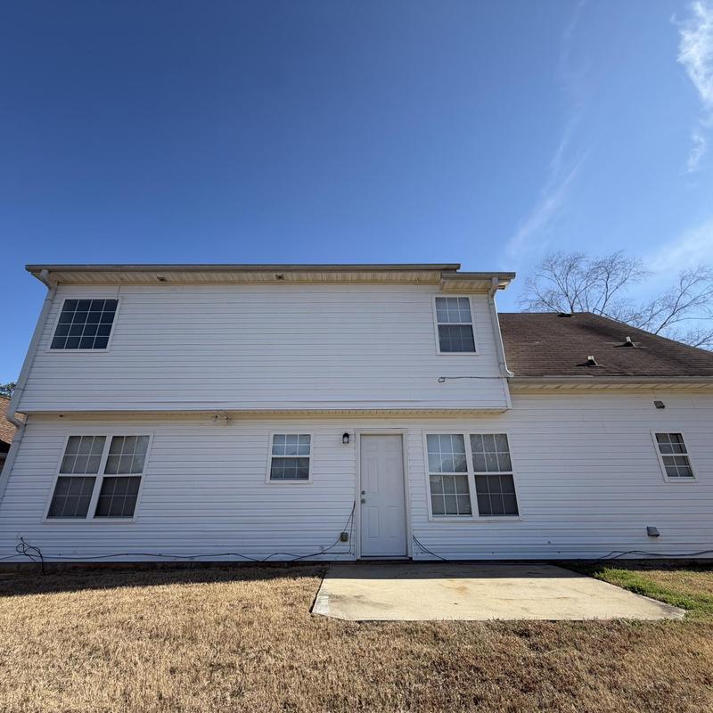 Roof shingles missing and damaged with wall flashing issues