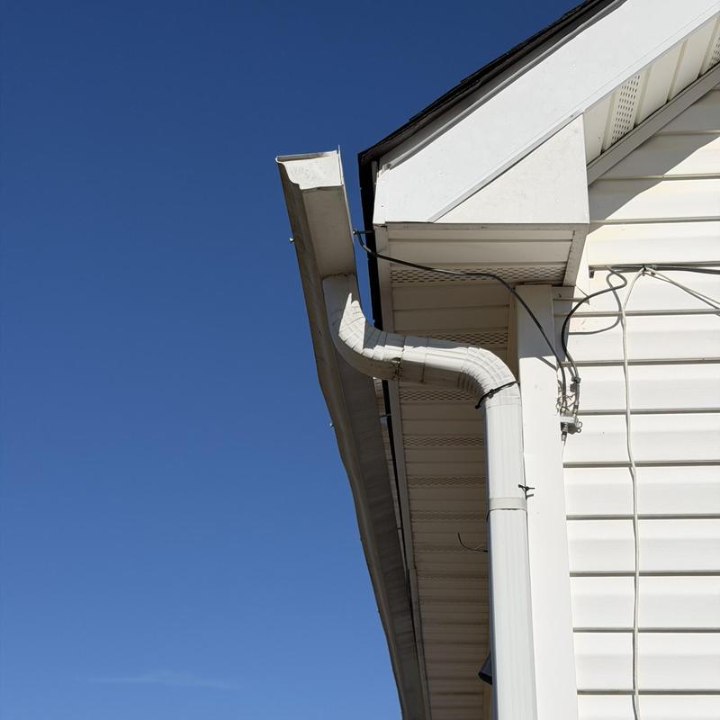 Gutter section pulling away from house edge