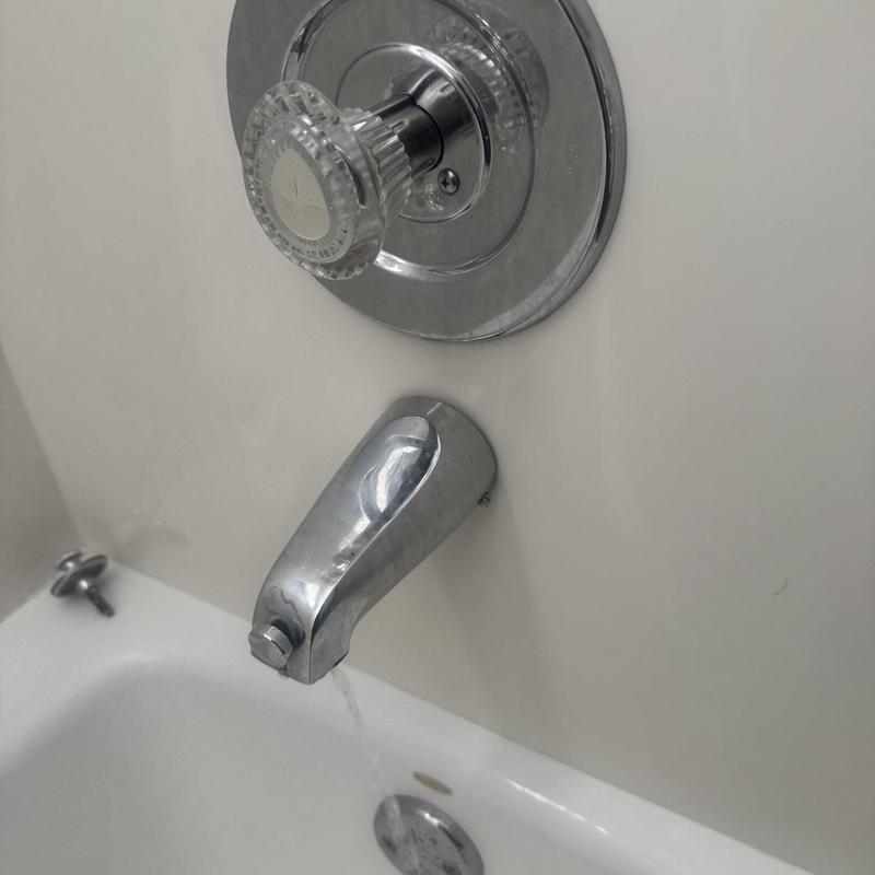 Bathtub faucet with crystal shower knob in bathroom