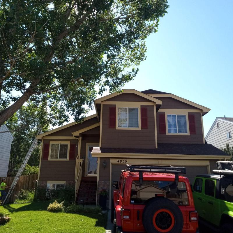 Residential roof with hail damage inspection underway Residential roof with hail damage inspection underway