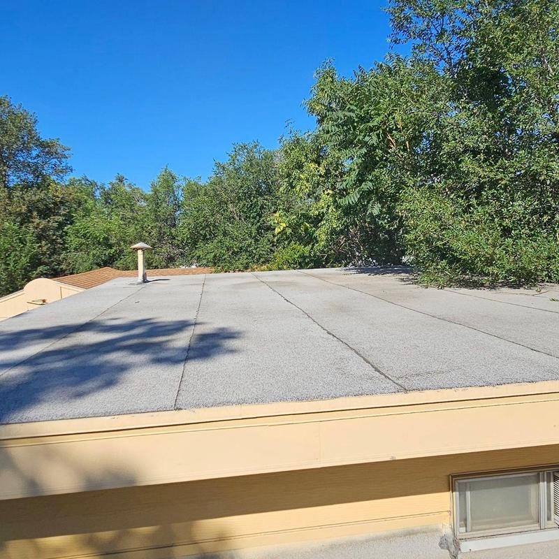 Flat roof with visible seams and vent pipe Flat roof with visible seams and vent pipe