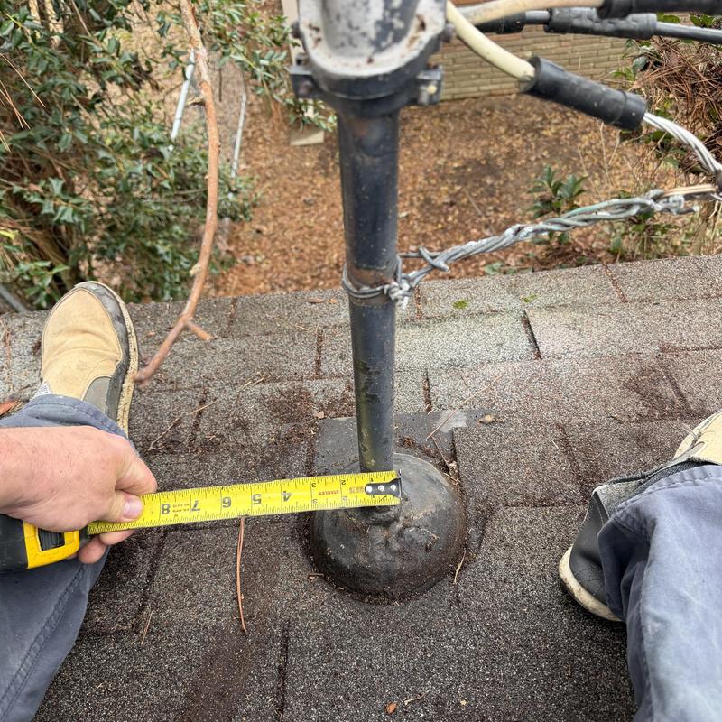 Roof pipe flashing measurement on shingle roof