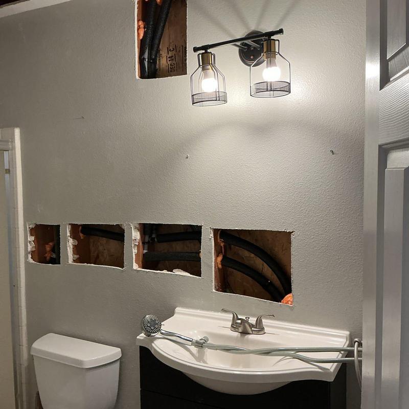 WirsboPex water piping behind bathroom wall cutouts