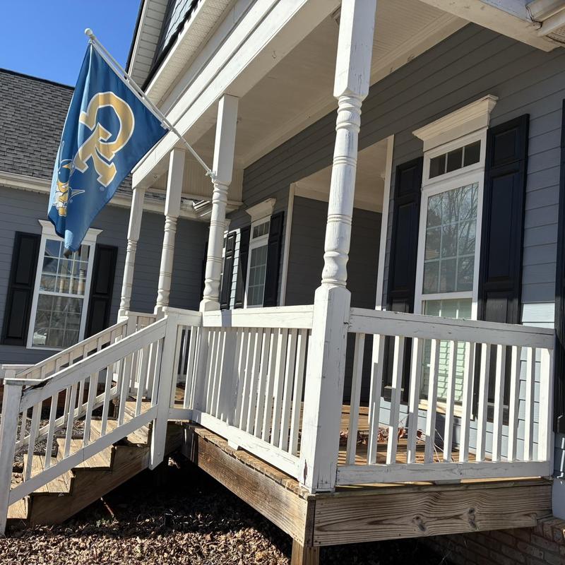 Front porch railing and deck structure with flag