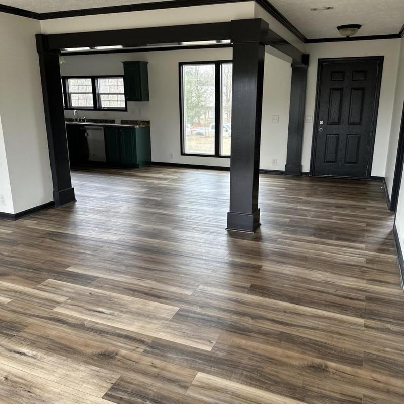 Vinyl plank flooring and rebuilt kitchen cabinets