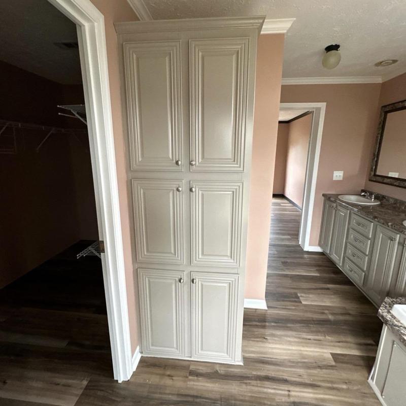 Built-in bathroom cabinets and new flooring installation