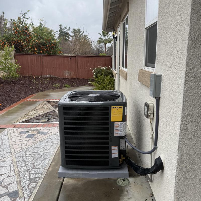 Goodman 4 ton R32 air conditioner on concrete pad Goodman 4 ton R32 air conditioner on concrete pad