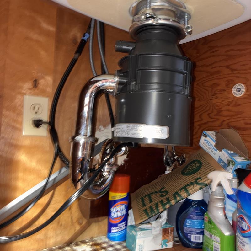 Garbage disposal and P-trap with new plumbing installation