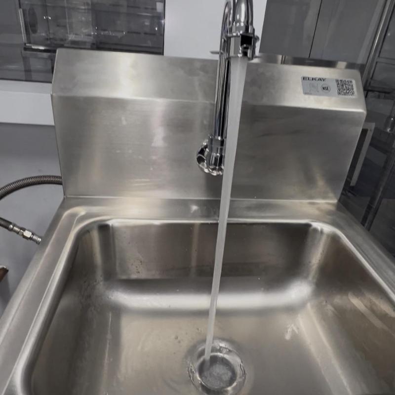 Foot pedal sink with mixing valve and new drain