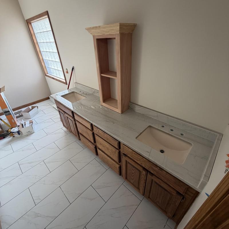 Granite bathroom countertops with dual sinks installation