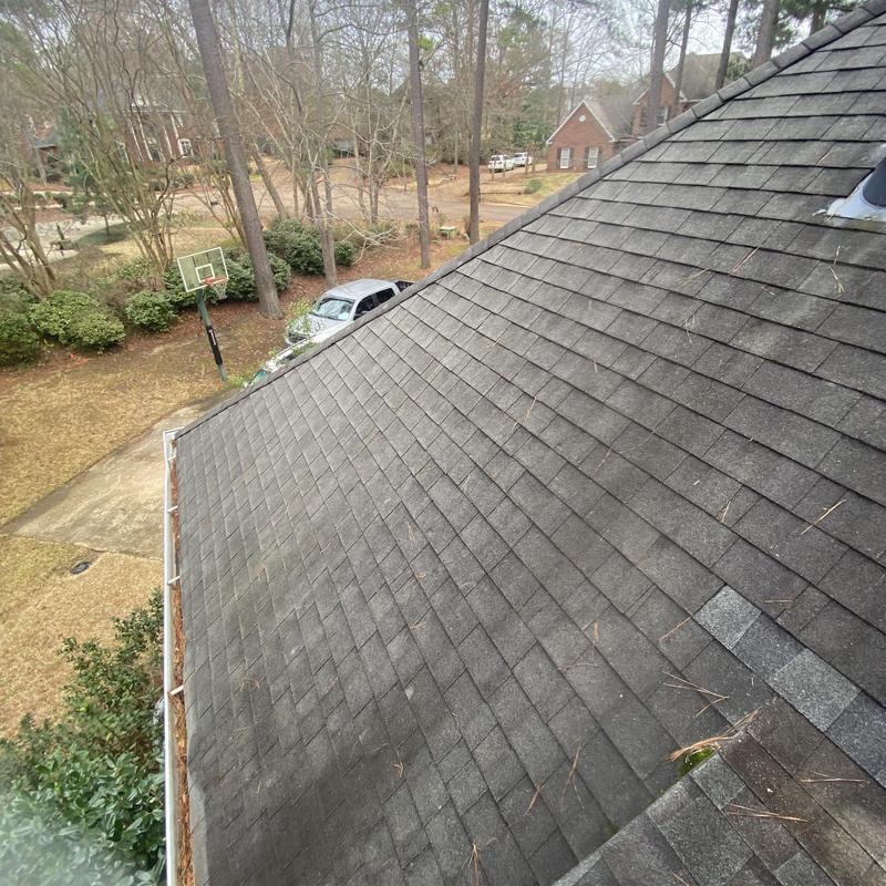 Asphalt shingle roof inspection for damage and aging