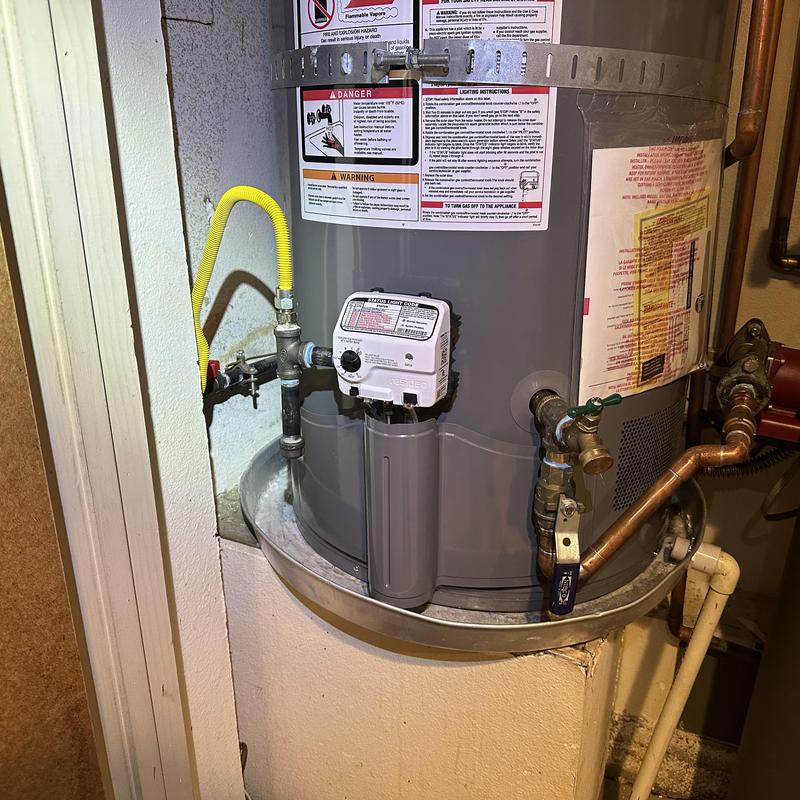 Water heater gas control valve installation in utility closet