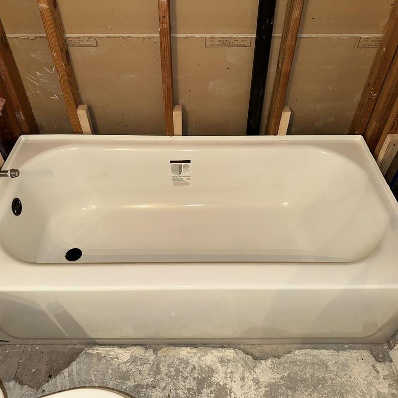 Bathtub with overflow drain and rough-in plumbing