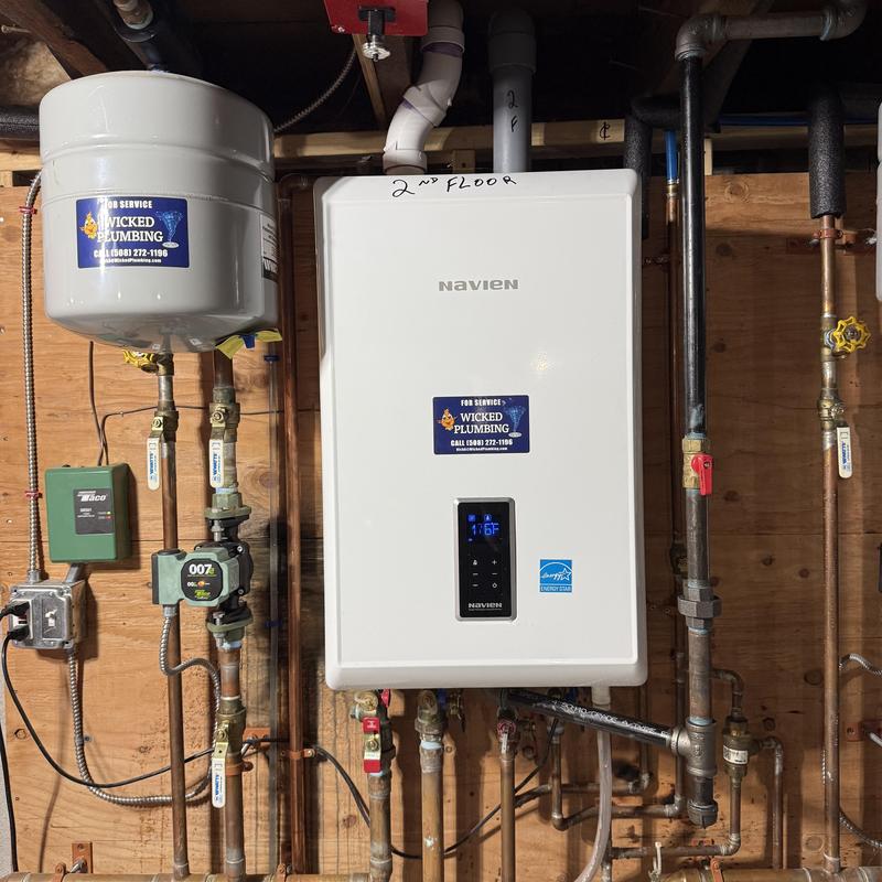 Navien boiler system with pipes in utility room