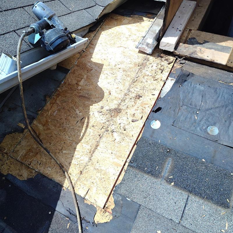 Chimney decking repair with new CDX plywood and shingles