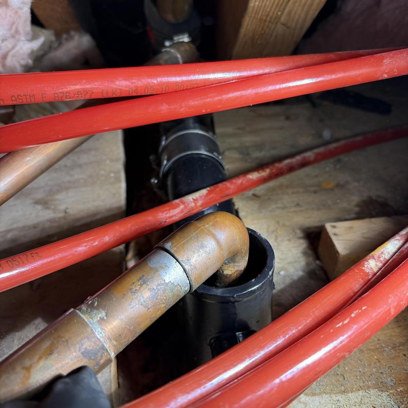 P-trap and drain line alignment in crawlspace