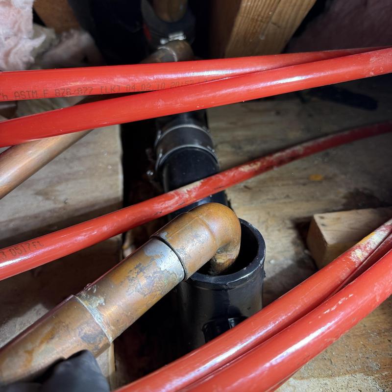 P-trap and drain line alignment in crawl space