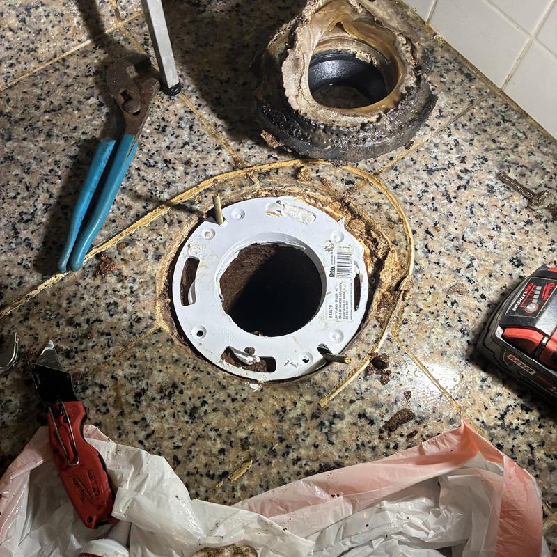 Toilet flange and base repair with new bolts and wax ring