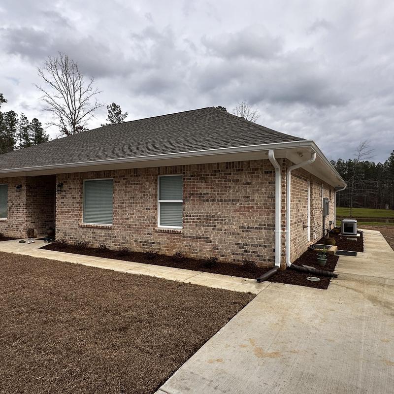 HDZ GAF roof system installed on brick house