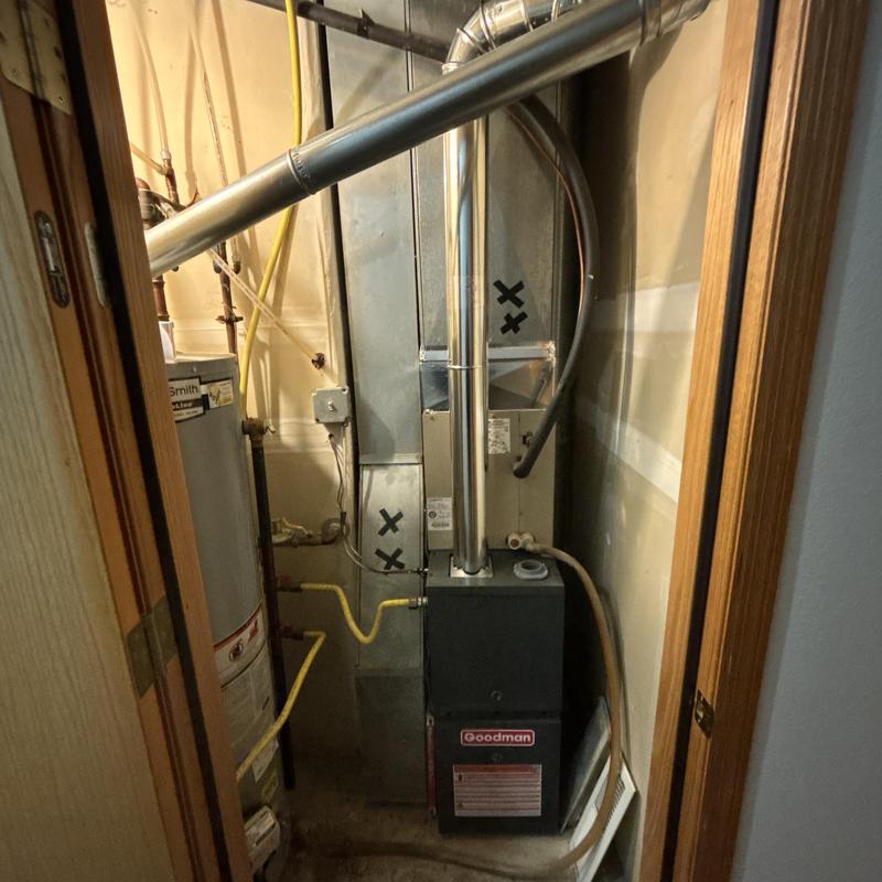 Goodman standard efficiency furnace installation in utility closet