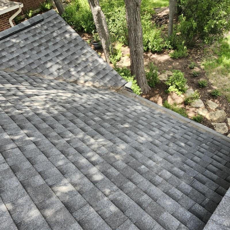 GAF HDZ Weatherwood shingle roof with cleaned debris