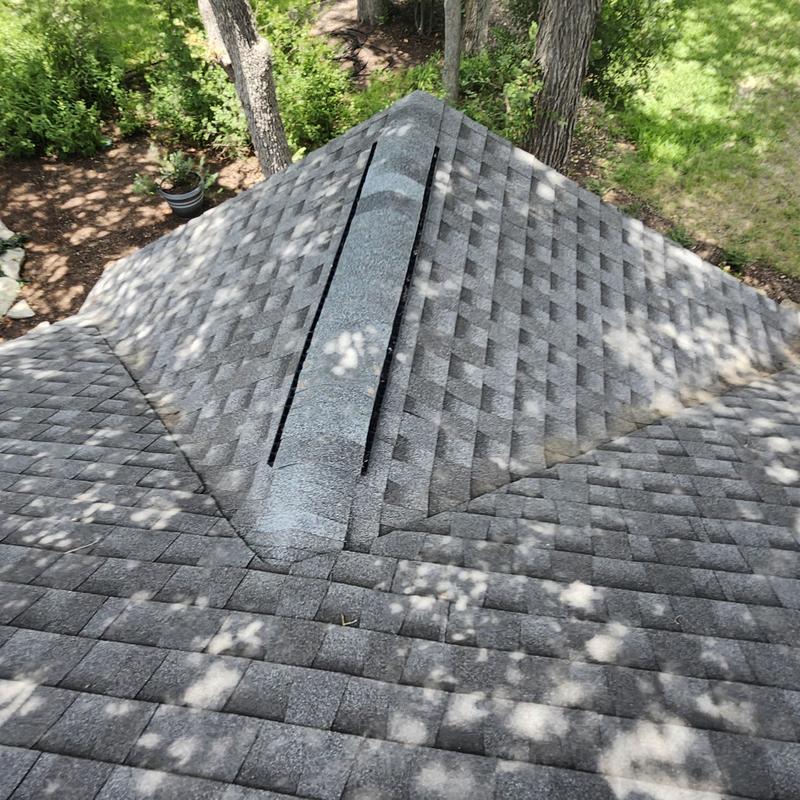GAF HDZ Weatherwood shingle roof with cleaned debris
