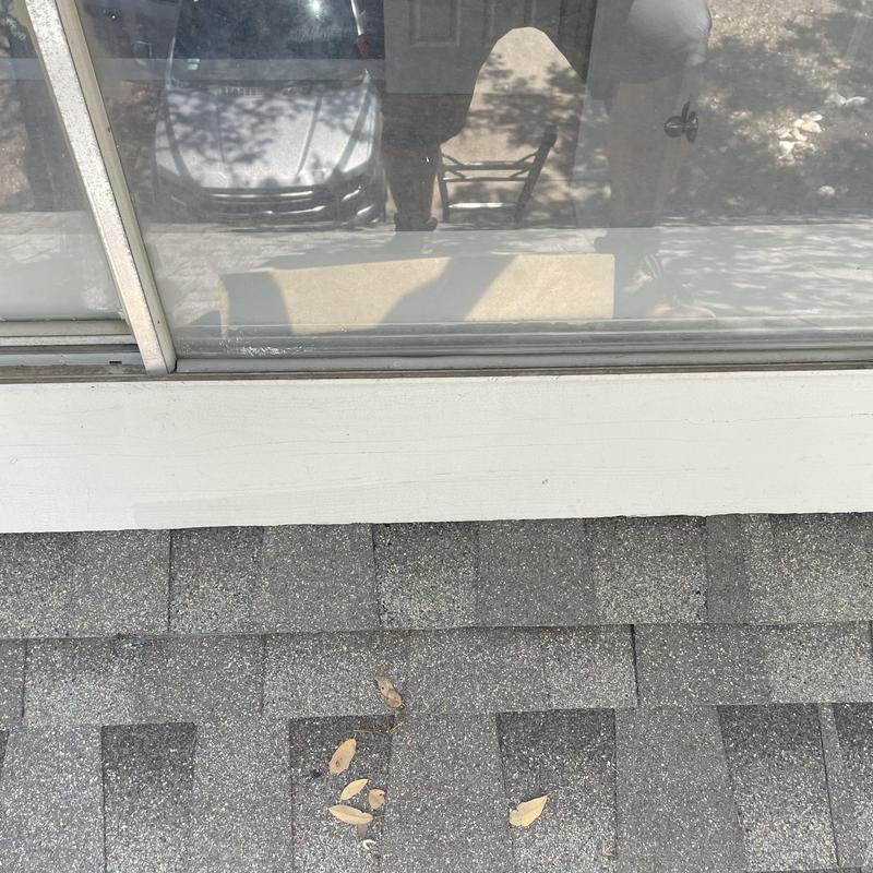 Galvanized drip edge flashing on shingle roof edge