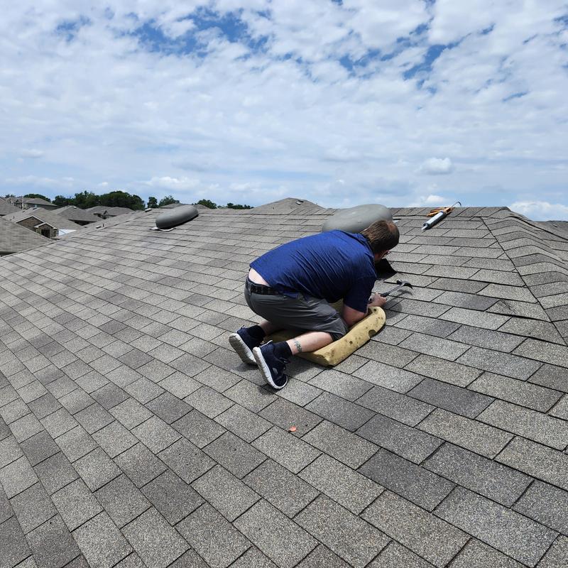 Weather-gray six-meter shingles installation on roof