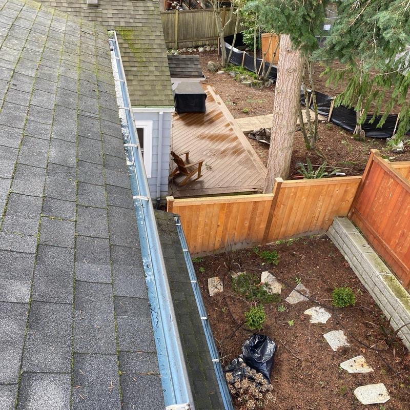 Gutter system cleaning and roof leaf removal in Seattle