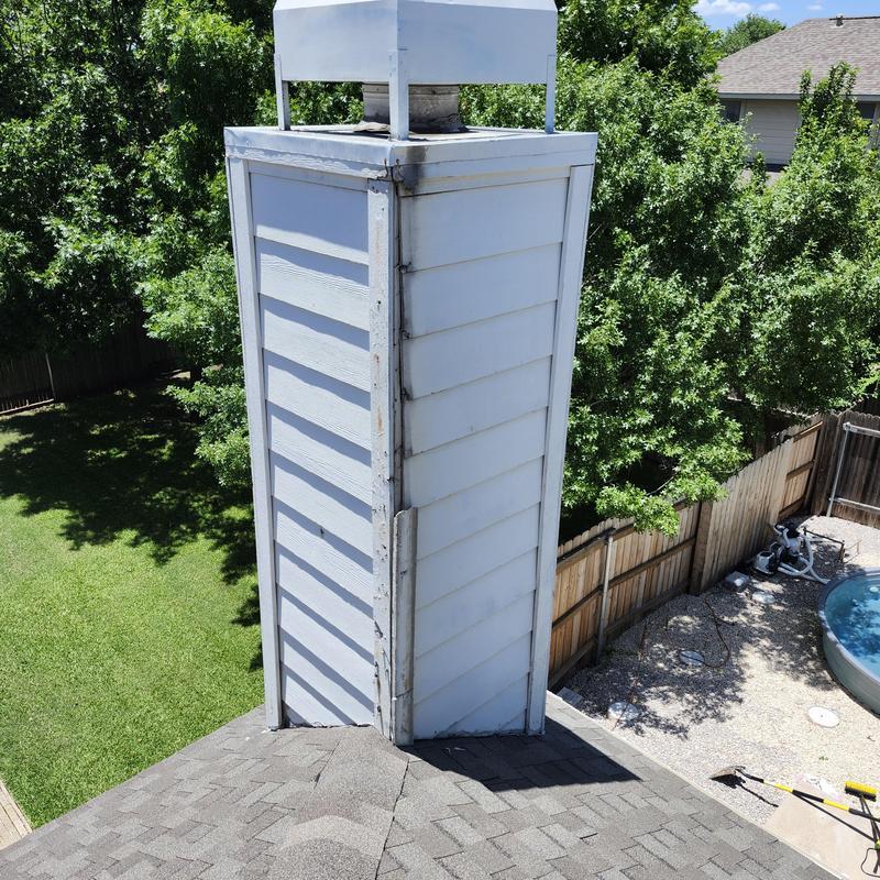 Chimney with new Hardie Board siding and trim