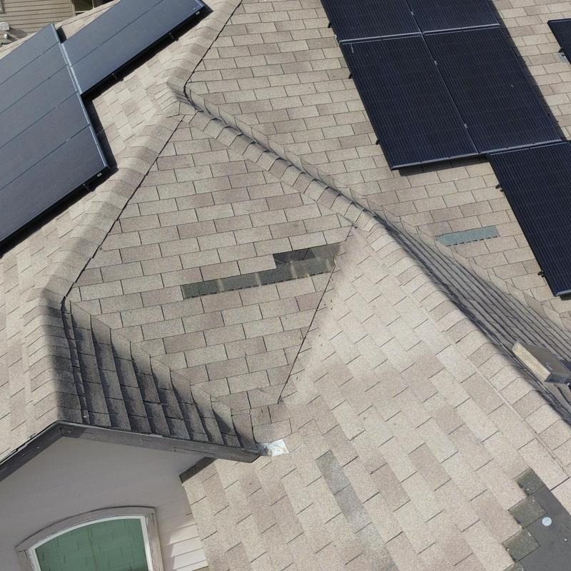 GAF Royal Sovereign shingles on residential roof with solar panels