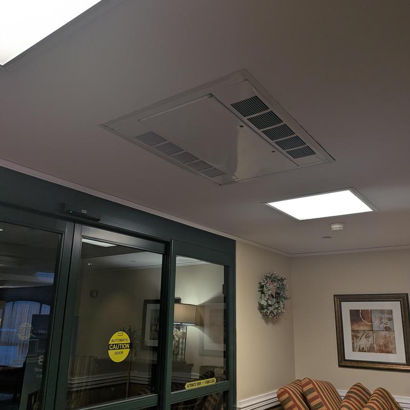 Ceiling heating vent in vestibule of multi-person property