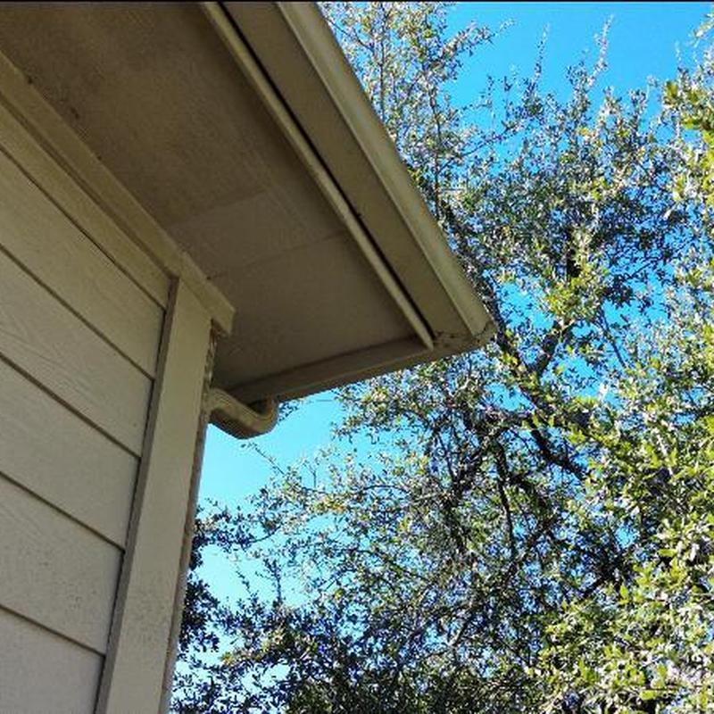 Fascia and soffit with gutter on house corner