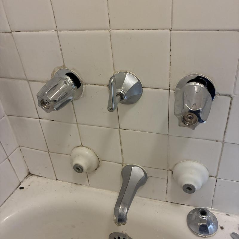 Bathtub faucet and valve trim installation in apartment
