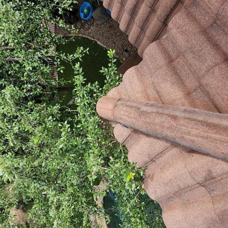 Clay barrel roof tiles with hip and ridge installation Clay barrel roof tiles with hip and ridge installation