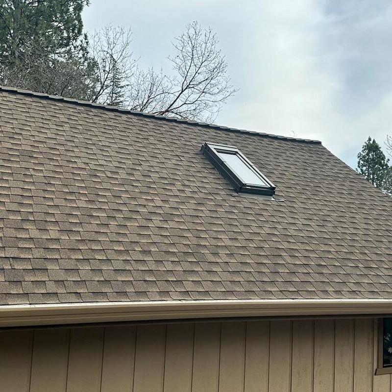 GAF lifetime asphalt shingle roof with skylight