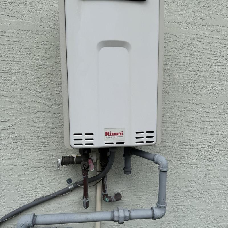 Tankless water heater with new gas regulator installed
