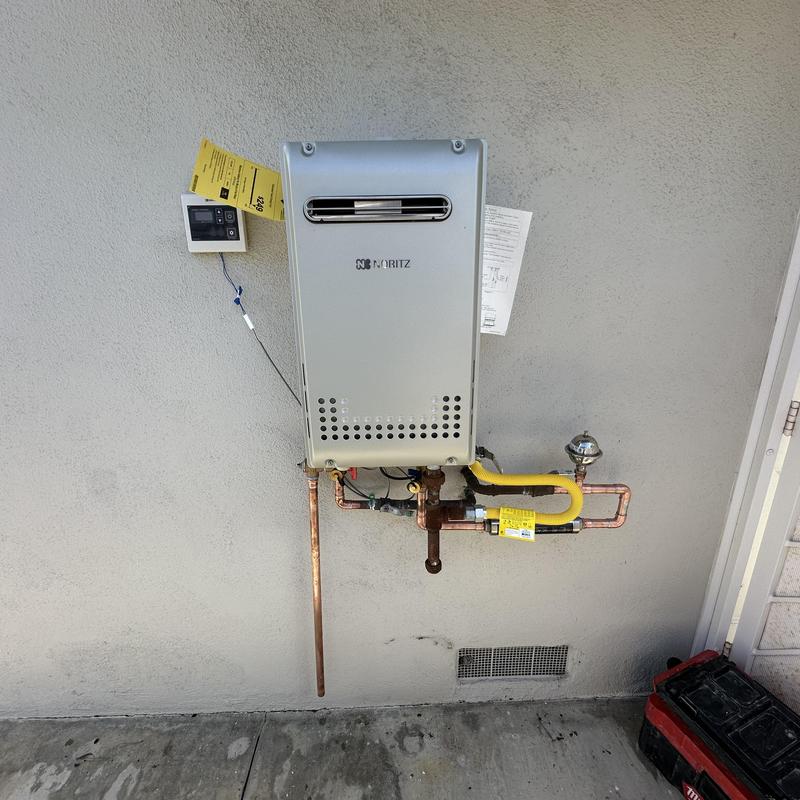 Tankless water heater with new copper piping installation