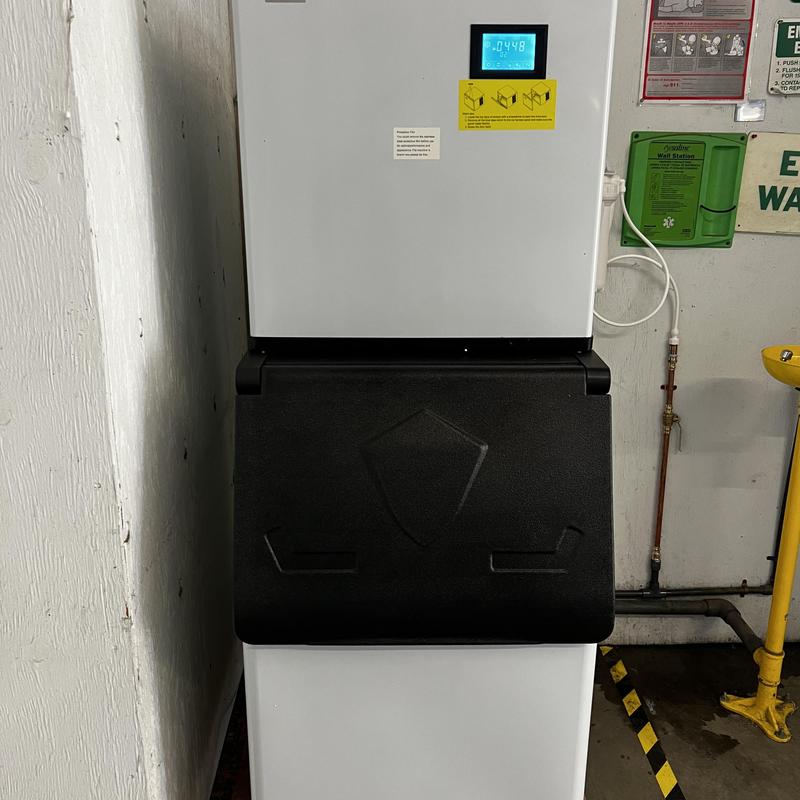 Ice machine with digital display installed indoors