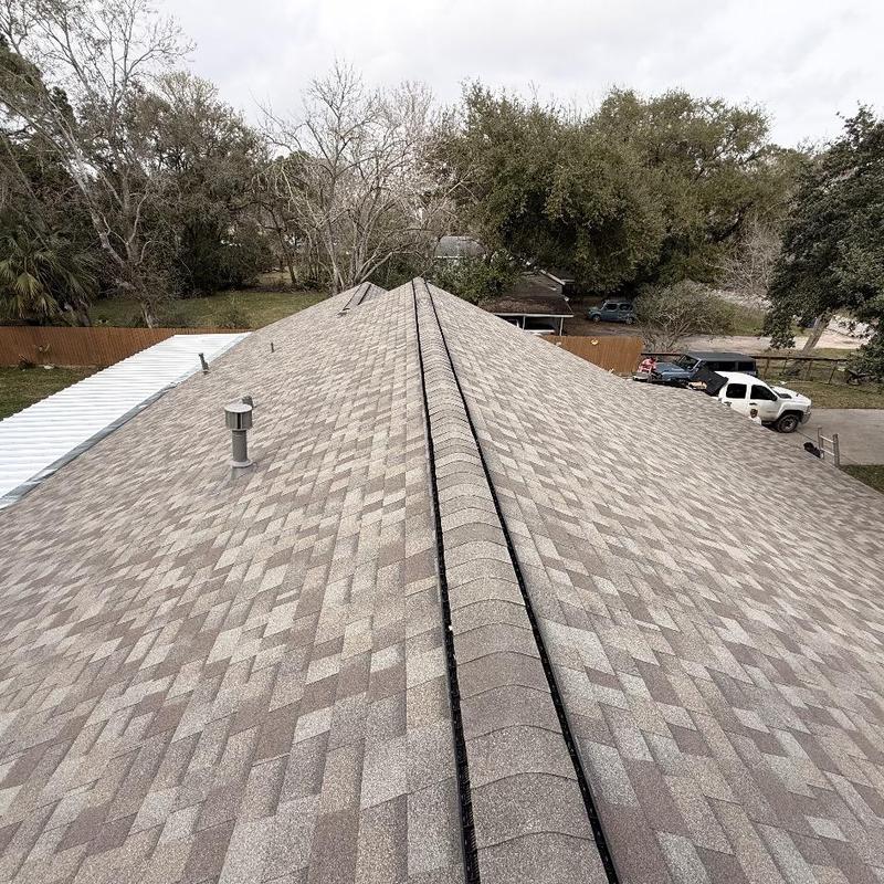 Owens Corning asphalt shingle roof with ridge cap installation